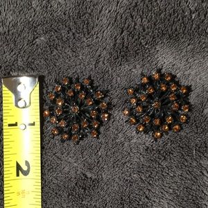 Black amber star earrings